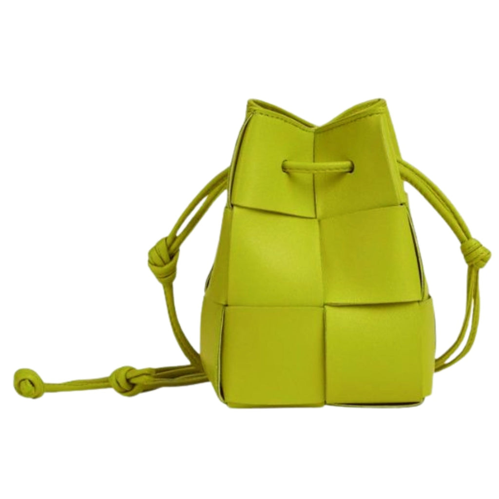 Lightweight leather woven mini bucket handbag in white with crossbody strap, kiwi gold