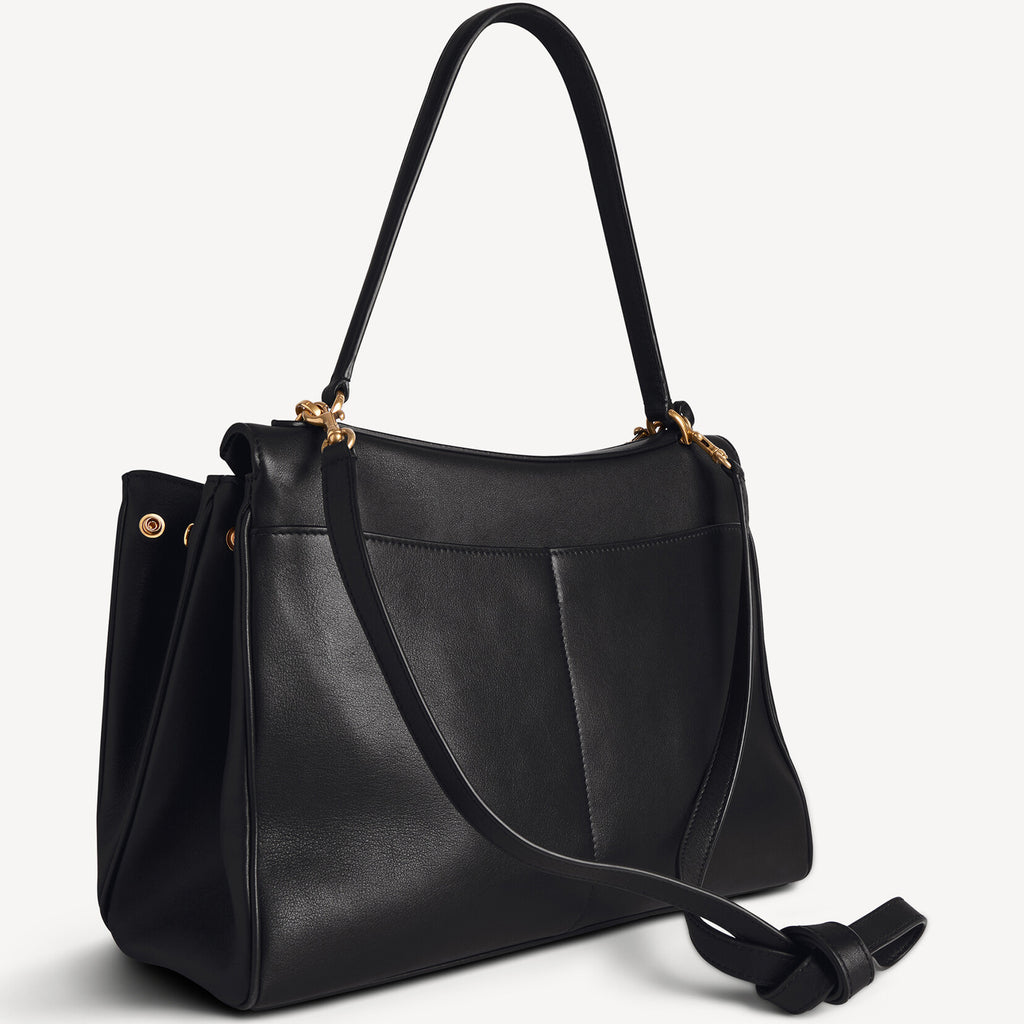 back of Rodeo style slouchy medium tote bag in black with brassy gold hardwear