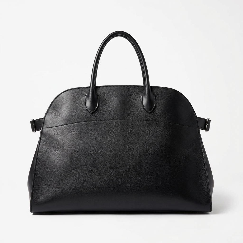 Black leather tote bag with toggle closure and side tabs