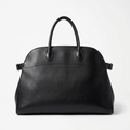 Black leather tote bag with toggle closure and side tabs