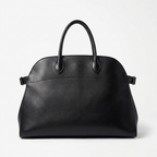 Black leather tote bag with toggle closure and side tabs