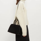 Belted 10 suede leather tote in black — styled model view