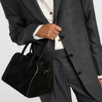 Belted 10 suede leather tote in black — model shot