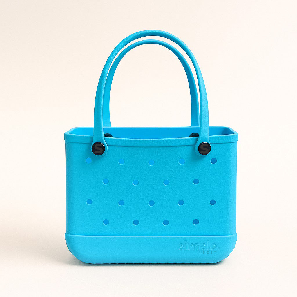 Small EVA Tote in TIFF. Modern turquoise-blue mini tote made of waterproof, rubber-like EVA. Compact and stylish for daily use and outings.