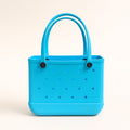 Small EVA Tote in TIFF. Modern turquoise-blue mini tote made of waterproof, rubber-like EVA. Compact and stylish for daily use and outings.