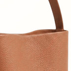 Vertical soft leather tote in camel brown — detail view
