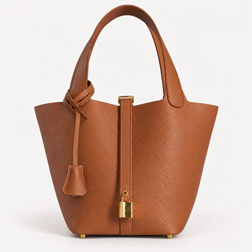 Classic 18 bucket bag in gold leather with mini lock design and gold-tone hardware
