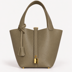 Classic 18 bucket bag in etaupe khaki leather with mini lock accent and removable drawstring pouch