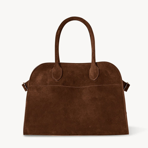 Front view of the Margaux 10 style suede tote bag in Coffee Brown with belted side details.