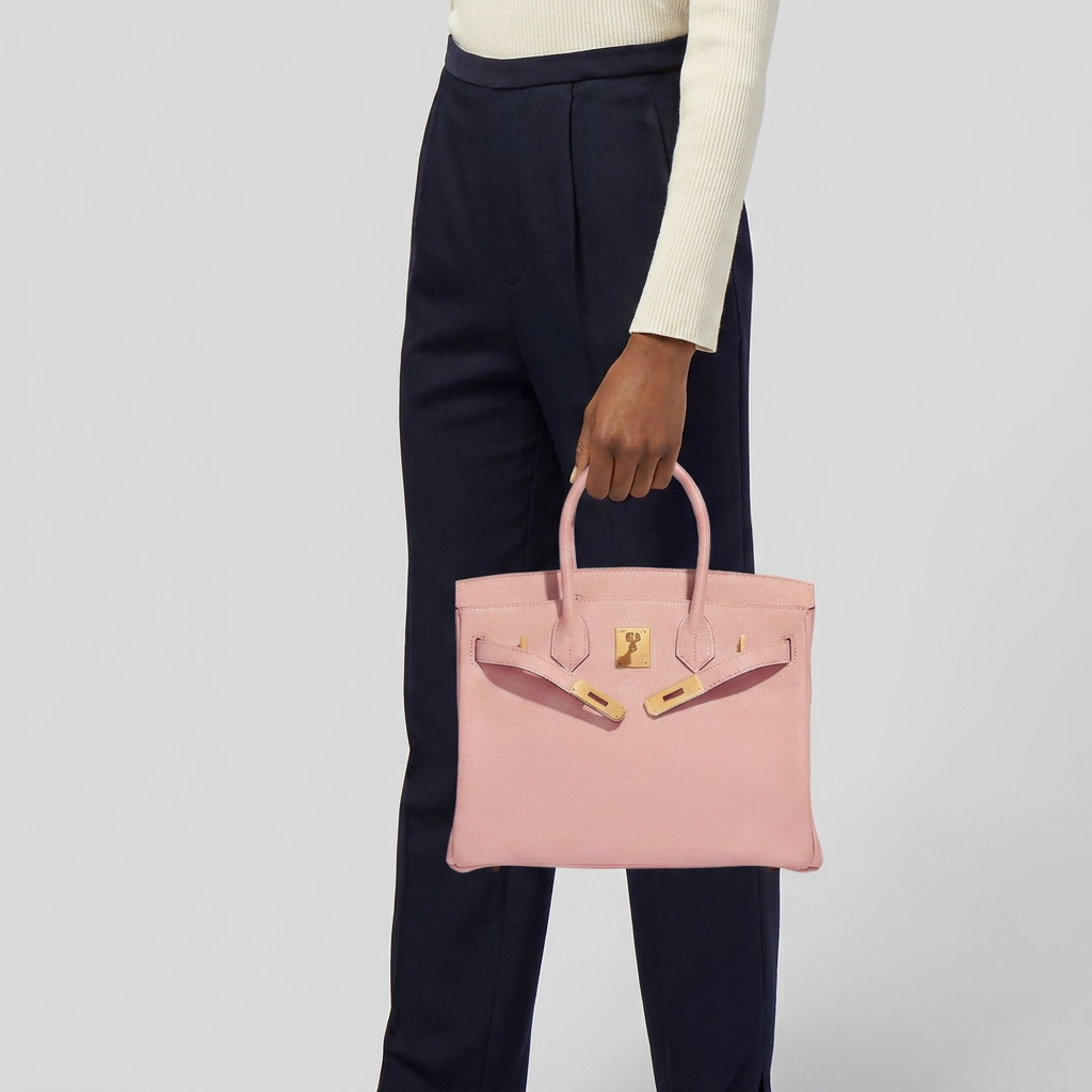 Classic 30 structured togo leather tote in baby pink — model shot