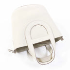 Compact Loop bucket bag in white — detail view