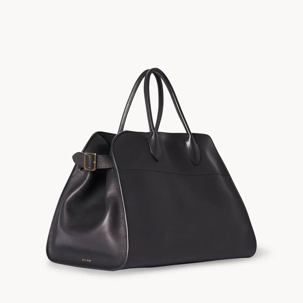 Black leather tote bag with toggle closure and side tabs