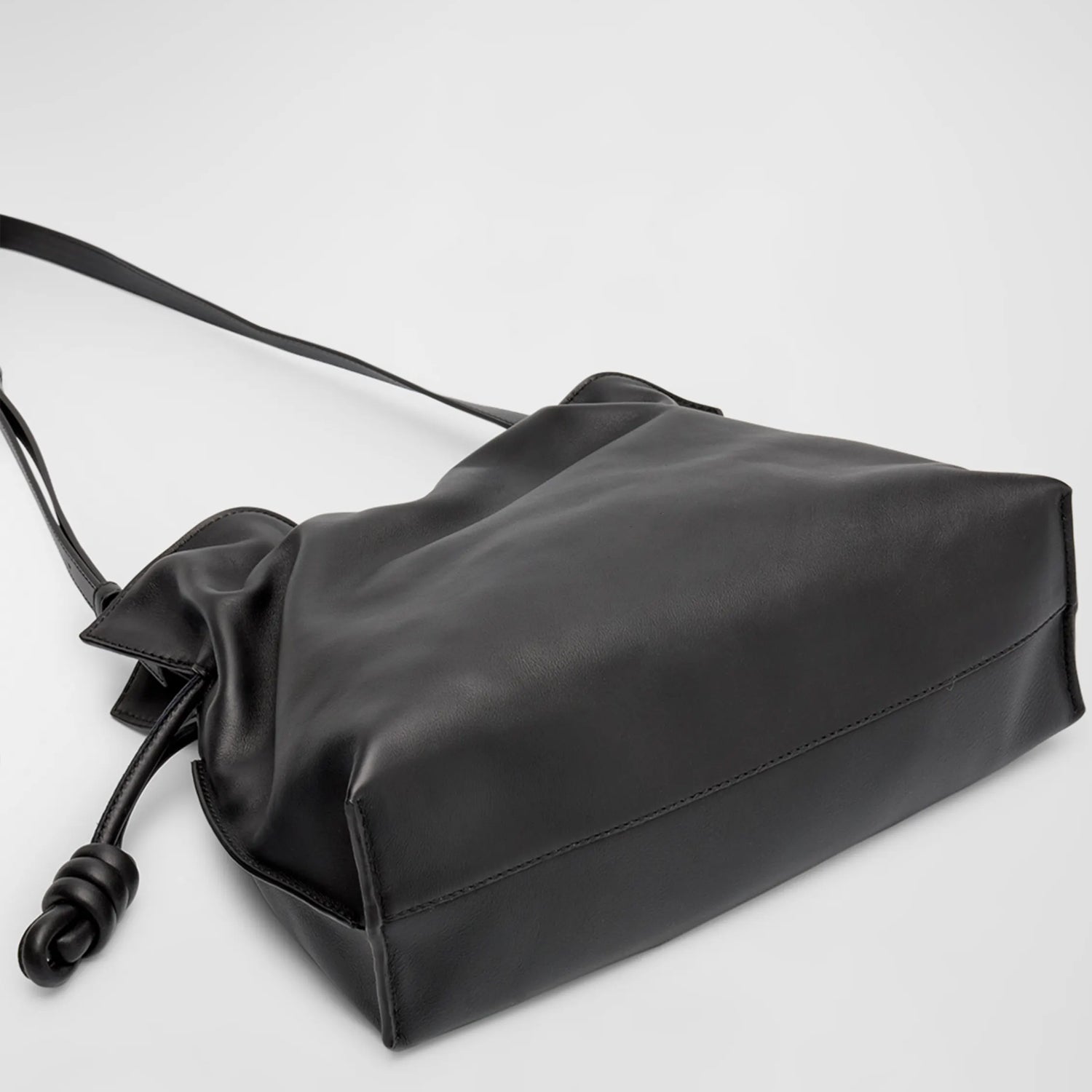Close-Up of Knotted Drawstring Detail and Strap Hardware in Black Finish