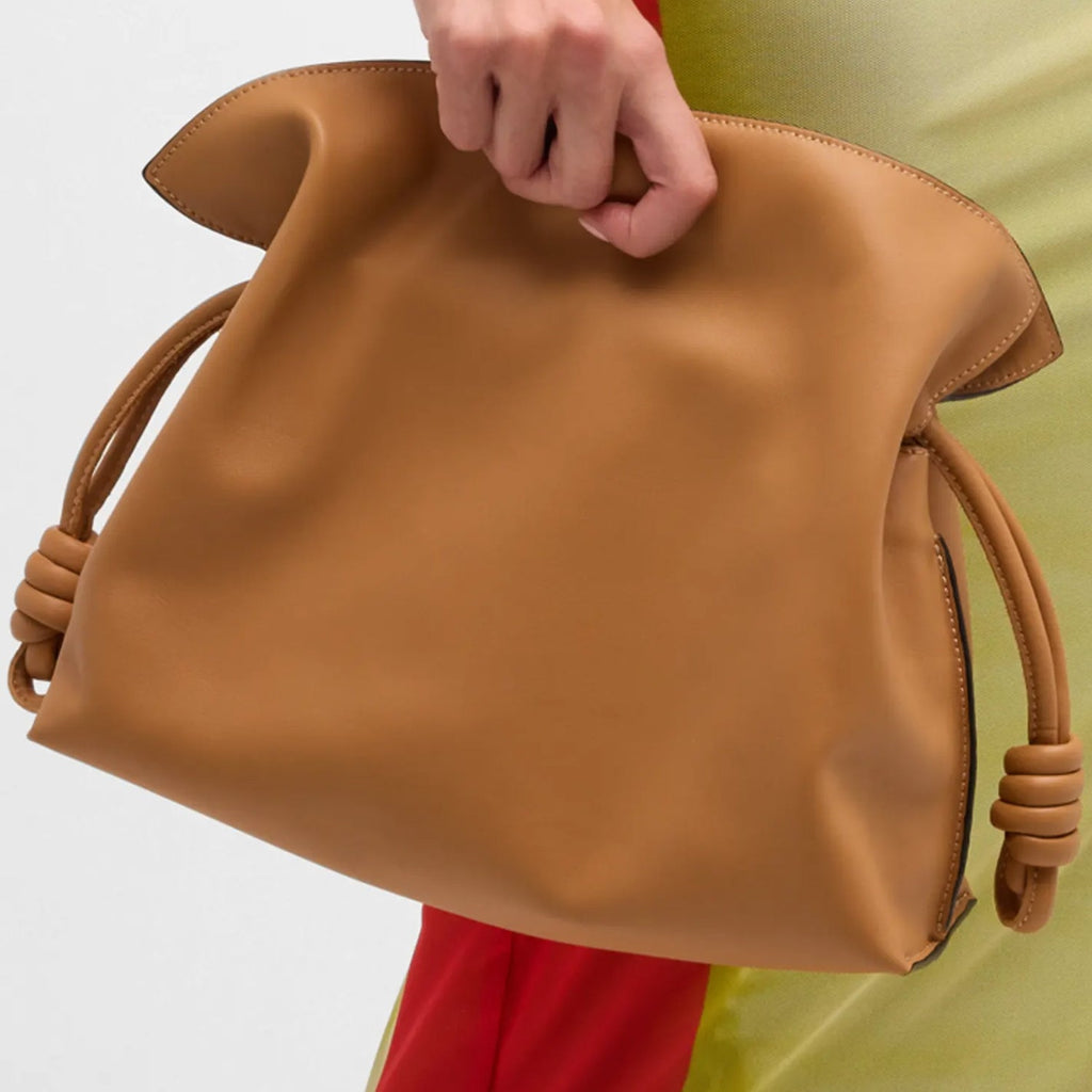 Drawstring Detail and Strap Attachment on Warm Desert Leather Bag