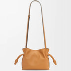 Drawstring Detail and Strap Attachment on Warm Desert Leather Bag