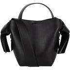 Black Mini Bag Styled with Crossbody Strap and Silver Hardware