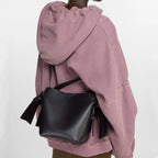 Black Mini Bag Styled with Crossbody Strap and Silver Hardware