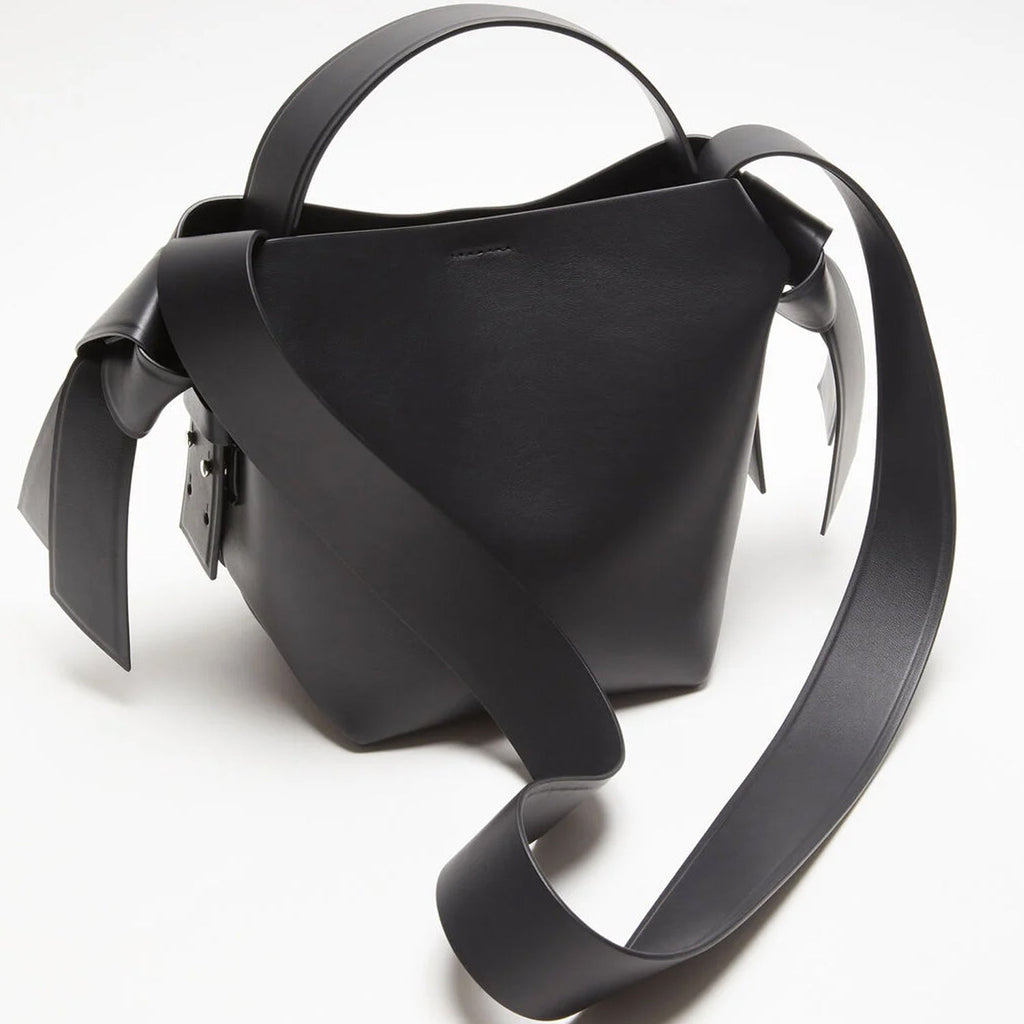 Side View of Black Knot Bag with Silver Adjustable Strap Attachments