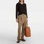 Vertical soft cowhide leather tote in brown — styled model view