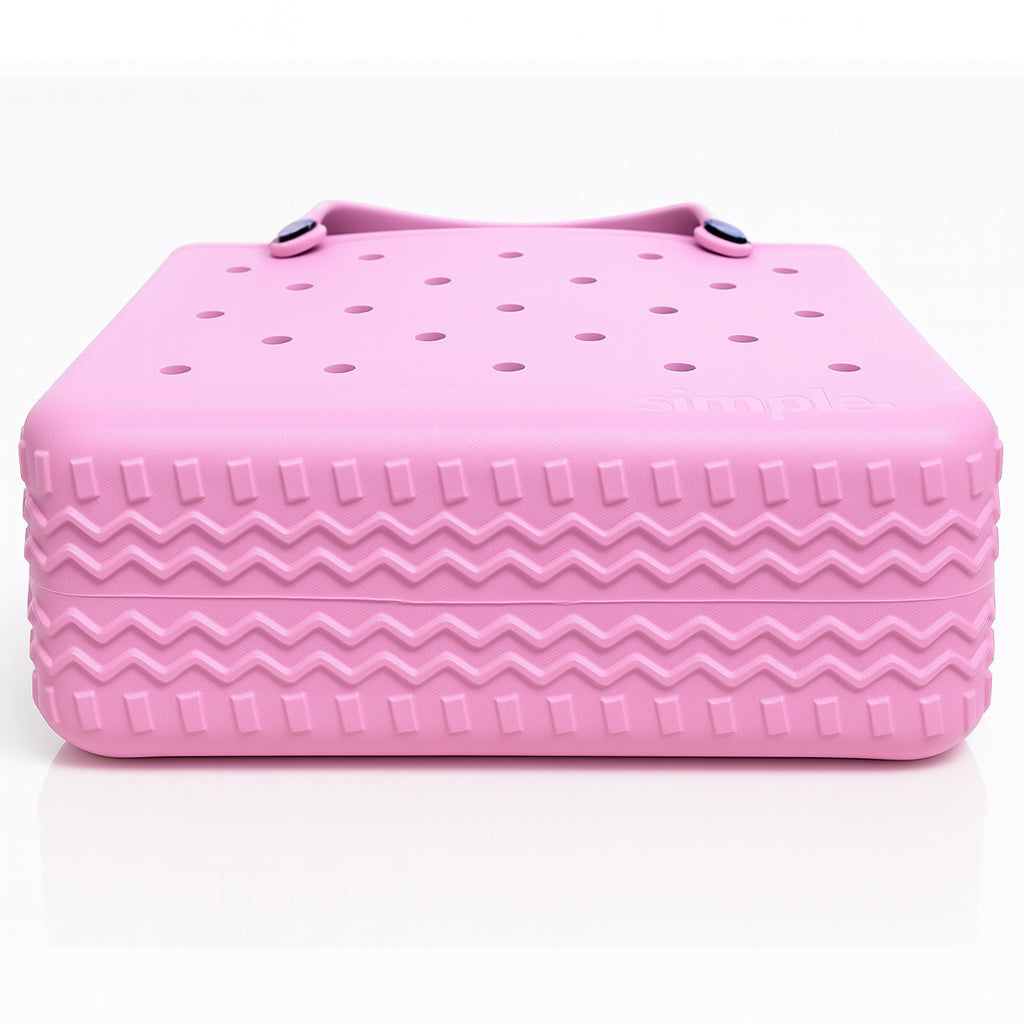 Medium EVA Tote in Blowing Bubbles baby pink. Lightweight, waterproof, rubber-like material. Ideal for everyday errands, gym, or beach use. Sturdy