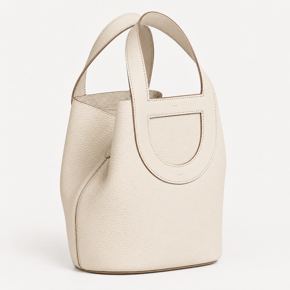 Compact Loop bucket bag in white leather with strap detail
