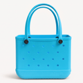 Small EVA Tote in TIFF. Modern turquoise-blue mini tote made of waterproof, rubber-like EVA. Compact and stylish for daily use and outings.