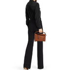 Compact Sculptural Tan Leather Bag with Silver Accents