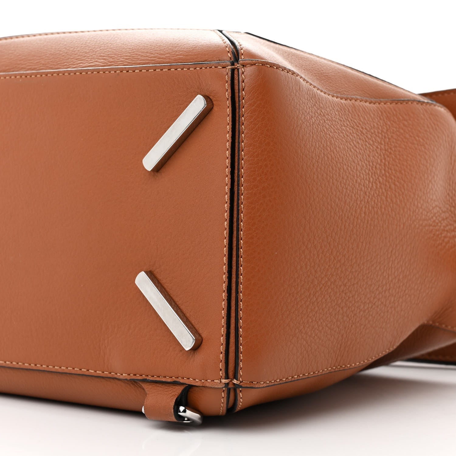 Compact Sculptural Tan Leather Bag with Silver Accents details