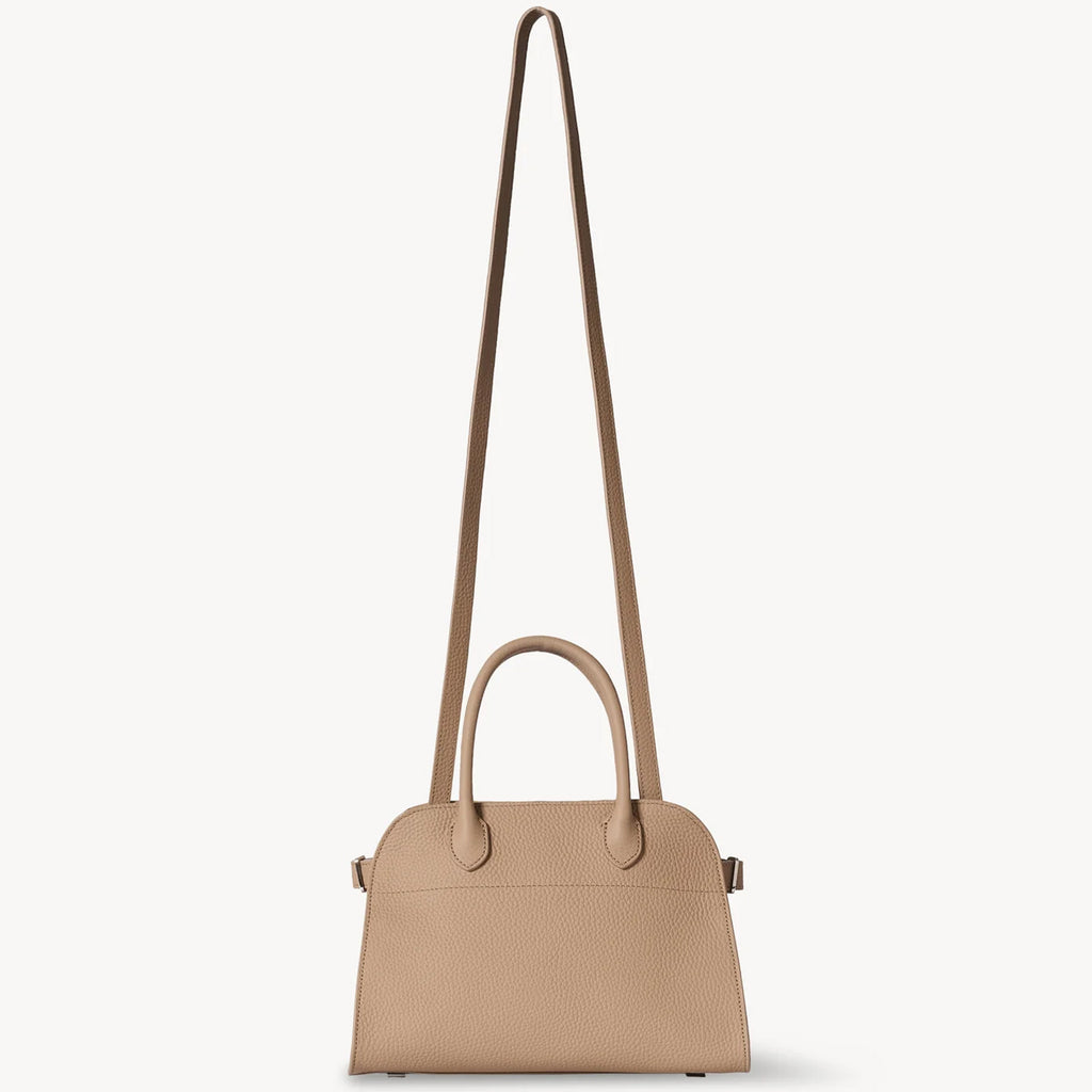 the Taupe Margaux 10 style compact structured leather tote with belted sides.