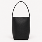 Vertical soft leather tote in black — front view showing natural grain
