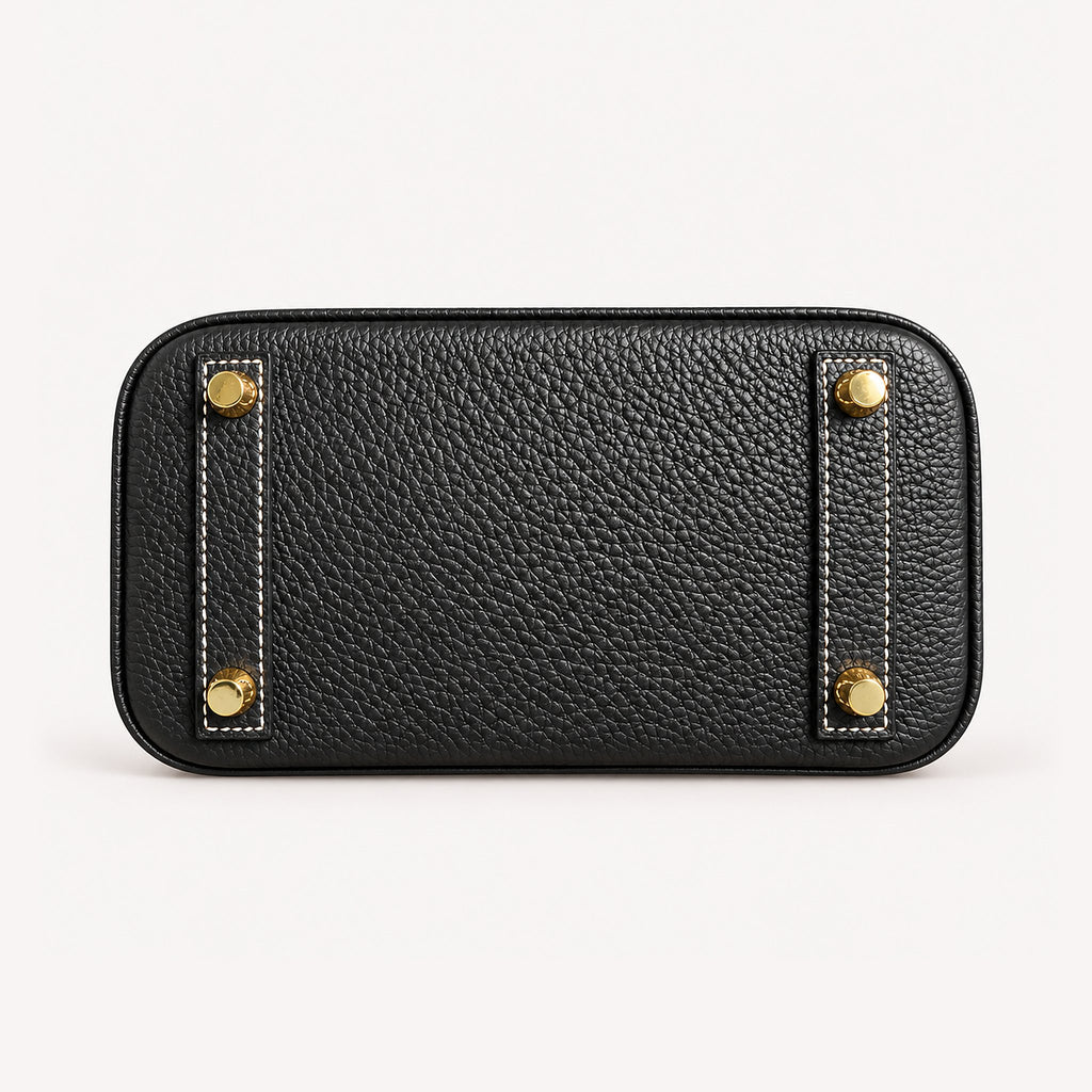 Classic Mini 20 togo leather tote in contrast black and white, base view with four protective feet