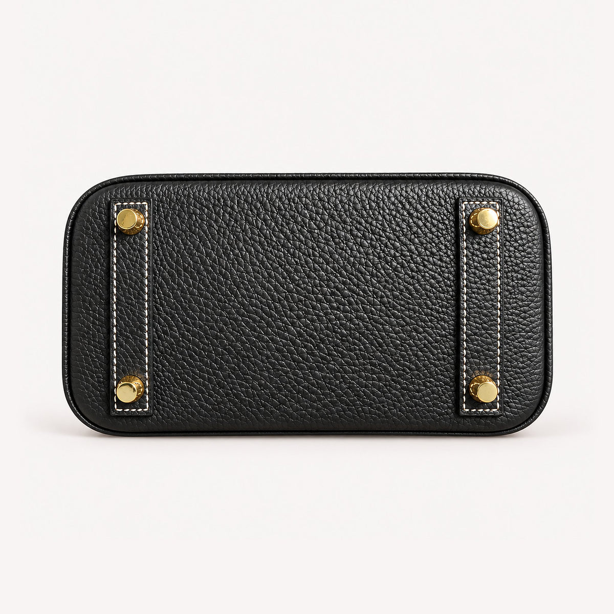 Classic Mini 20 togo leather tote in contrast black and white, base view with four protective feet