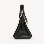 Classic Mini 20 togo leather tote in contrast black and white, side view