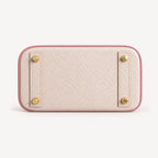 Classic Mini 20 togo leather tote in contrast pink, base view with four protective feet