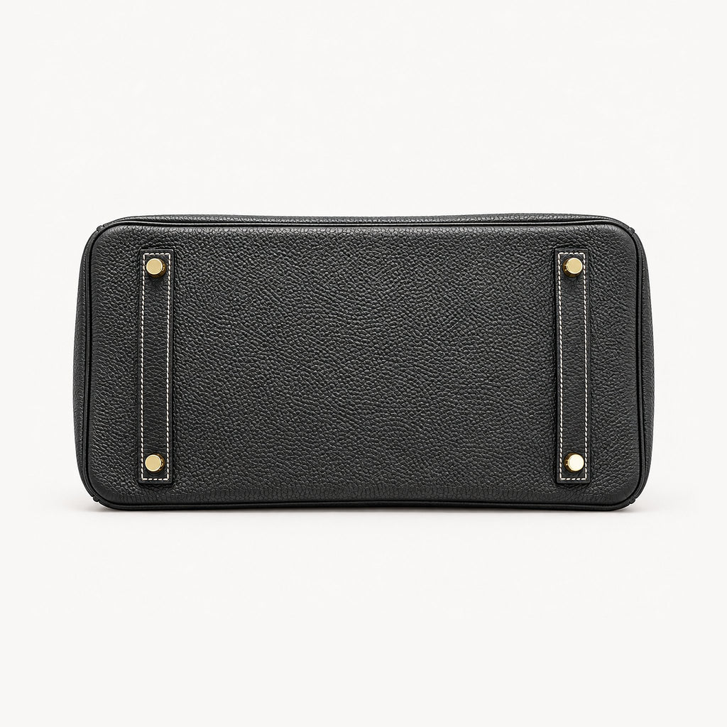 Classic 30 togo leather tote in contrast black and white, base view with four protective feet