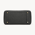 Classic 30 togo leather tote in contrast black and white, base view with four protective feet
