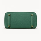 Classic 30 togo leather tote in dark green, base view with four protective feet