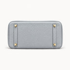 Classic 30 togo leather tote in grey blue, base view with four protective feet