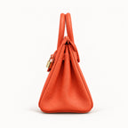 Classic 30 togo leather tote in orange, side view