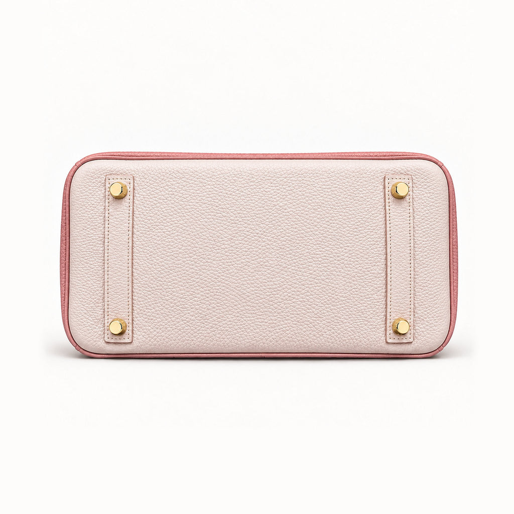 Classic 30 togo leather tote in contrast pink, base view with four protective feet