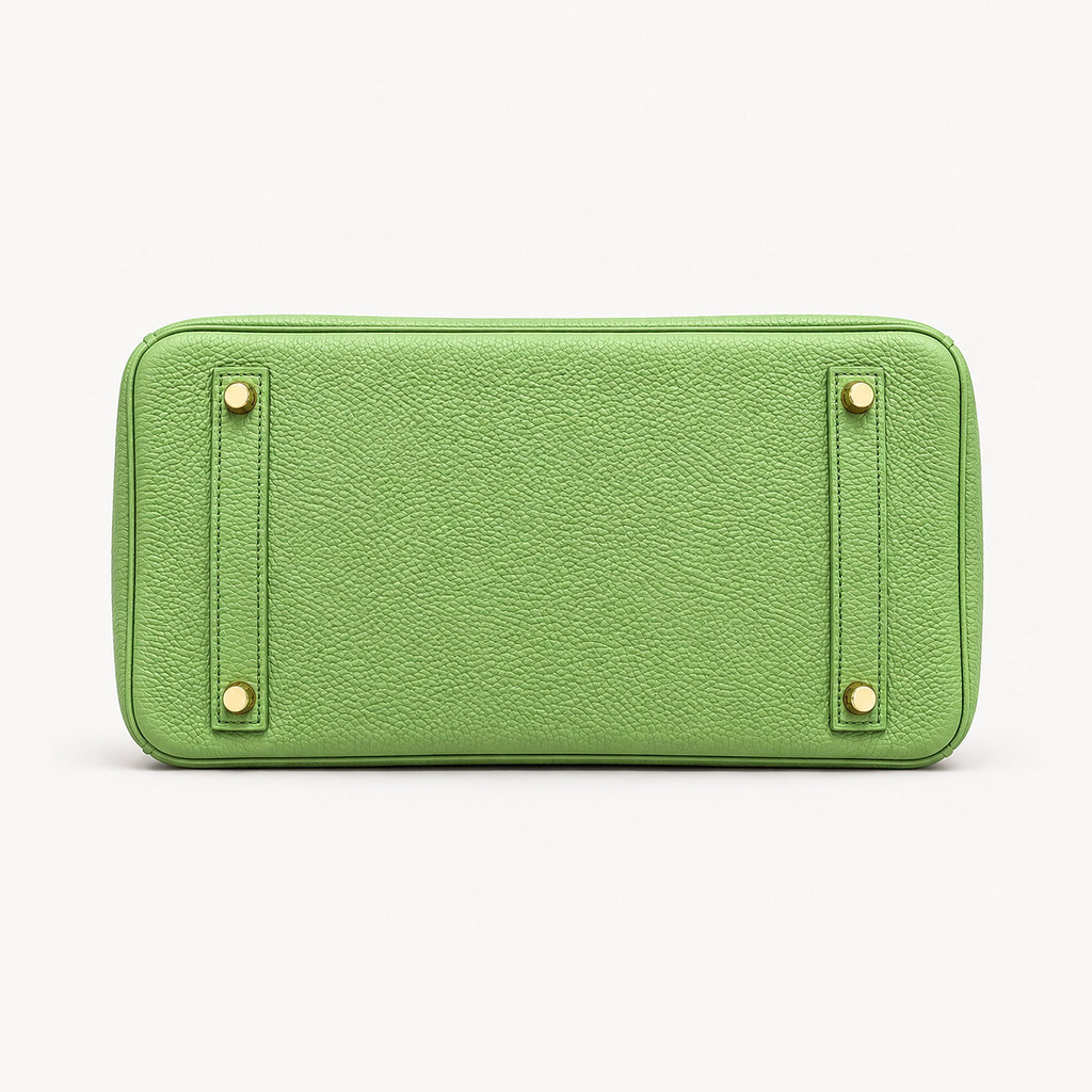 Classic 30 togo leather tote in pistachio, base view with four protective feet