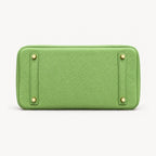 Classic 30 togo leather tote in pistachio, base view with four protective feet