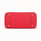 Classic 30 togo leather tote in red, base view with four protective feet