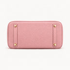 Classic 30 togo leather tote in rose sakura pink, base view with four protective feet