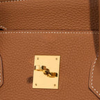 Classic 35 togo leather tote in brown, close-up of pebbled grain and gold-tone lock plate