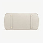Classic 40 togo leather tote in white, base view with four protective feet