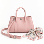 Weekday Tote Mini 23 cm open-top tote in baby pink with a matching shoulder strap and twilly scarf