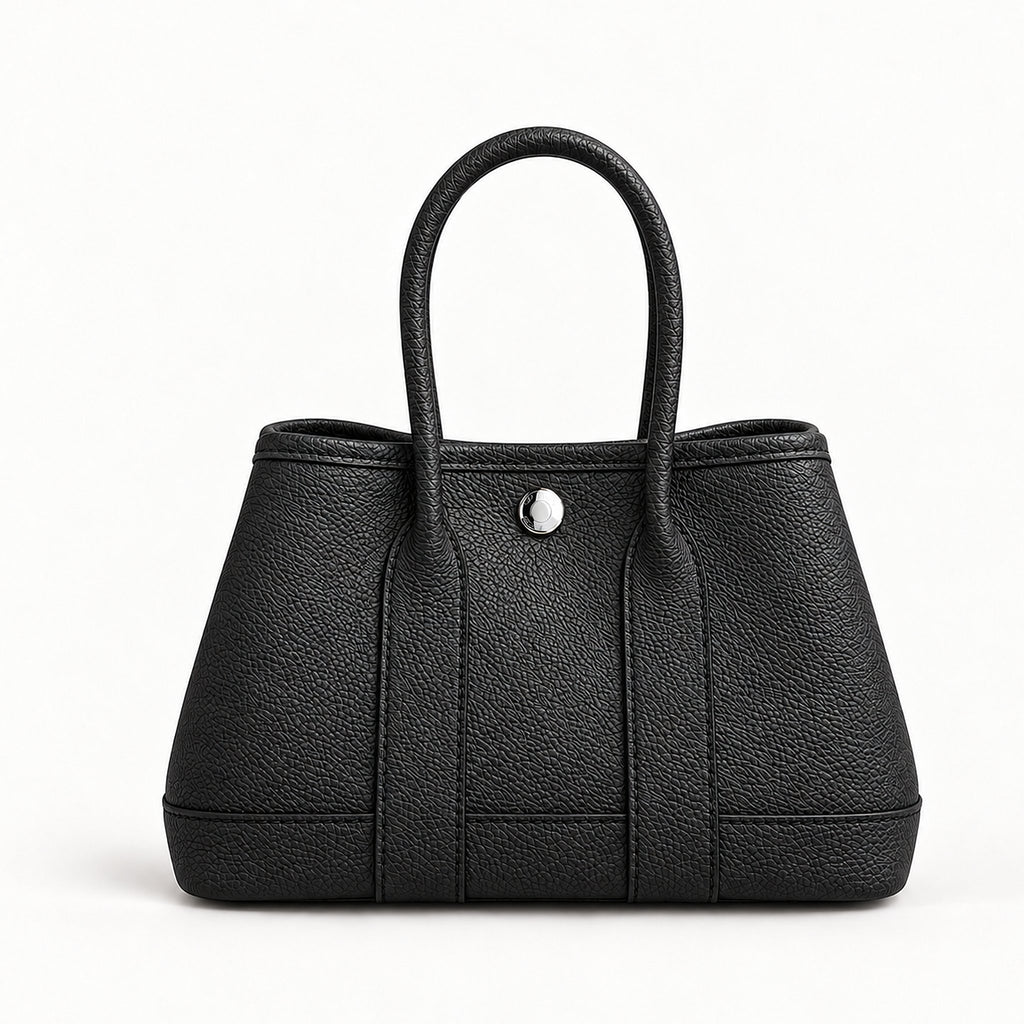 Weekday Tote Mini 23 cm open-top tote in black with silver-tone snap, front view