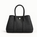 Weekday Tote Mini 23 cm open-top tote in black with silver-tone snap, front view
