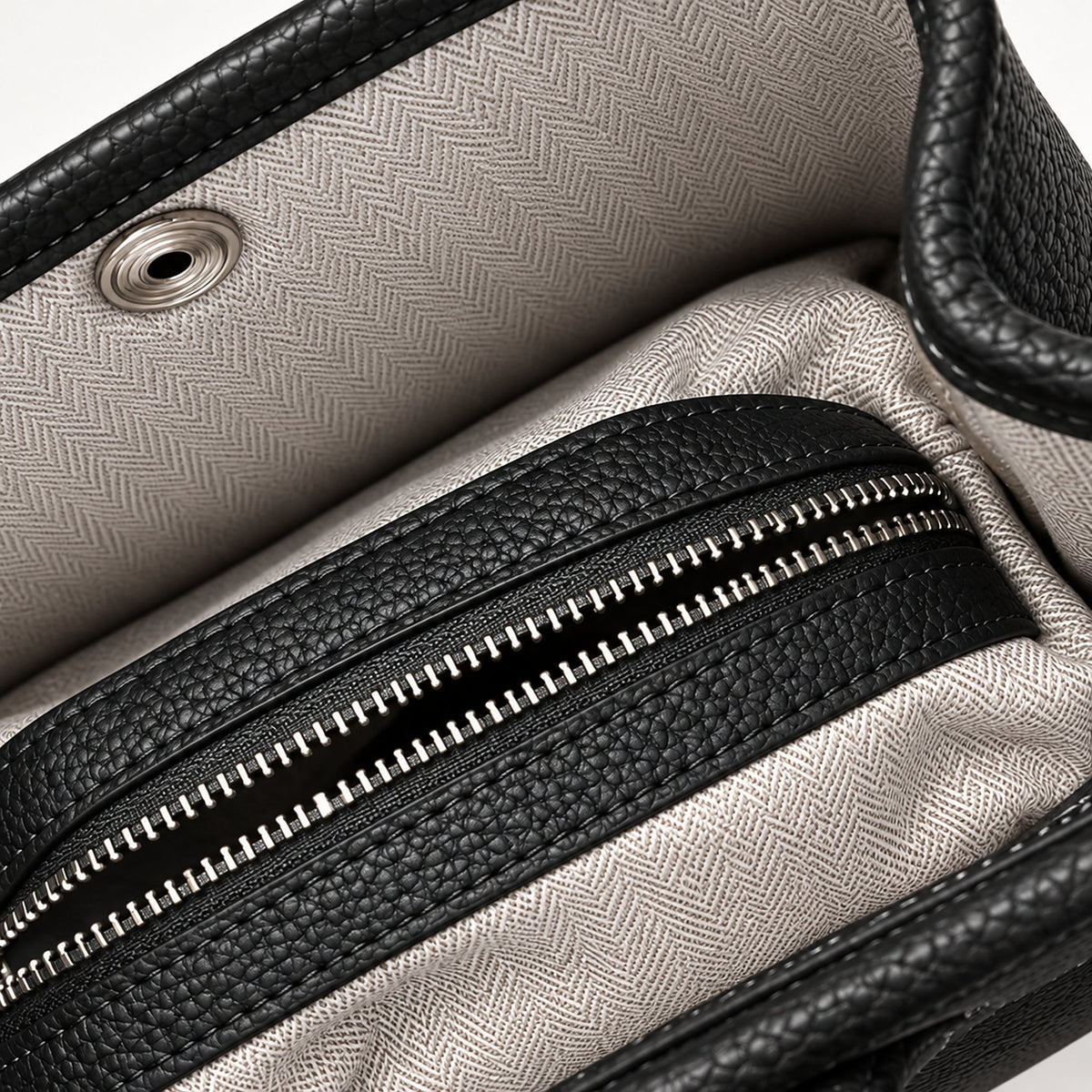 Weekday Tote Mini 23 cm open-top tote in black, interior view with herringbone lining and zip pocket